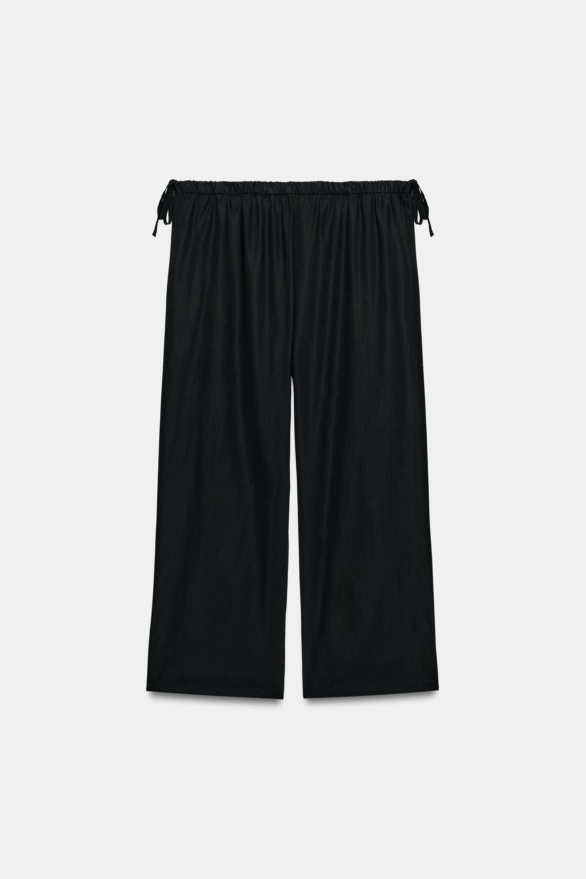 TIED ANKLE-LENGTH FLOWY PANTS